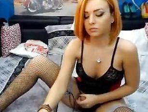 Yummy redhead shemale smokes and strokes all alone on webcam - Tranny.one